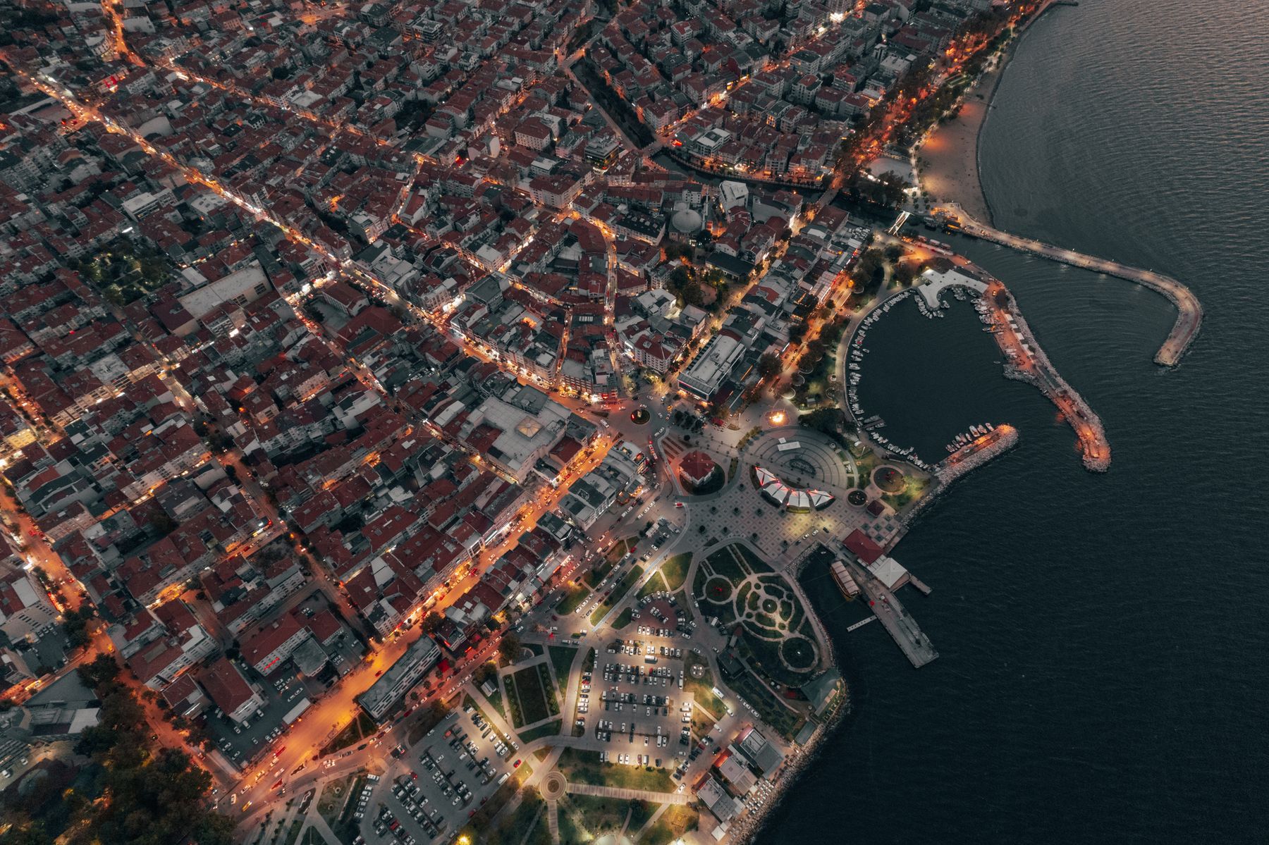 Aerial view of a coastal city at night